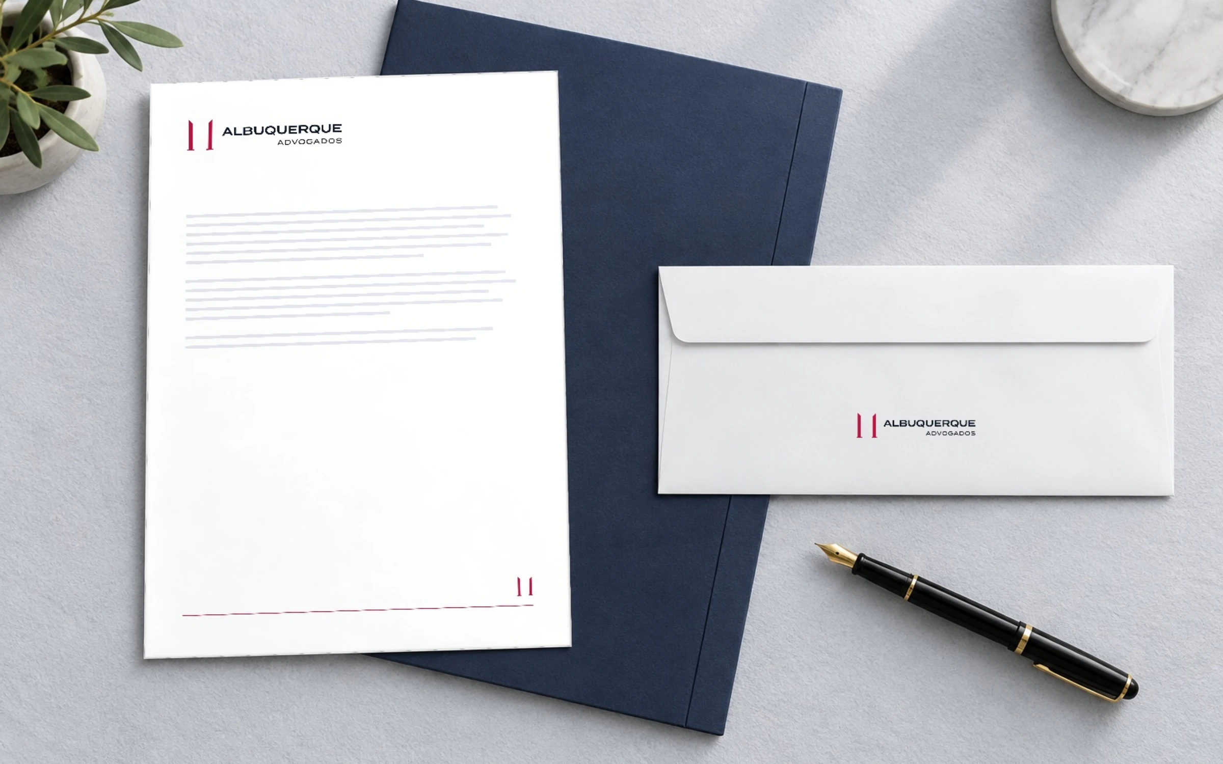 Papel timbrado, pasta e envelope com a marca