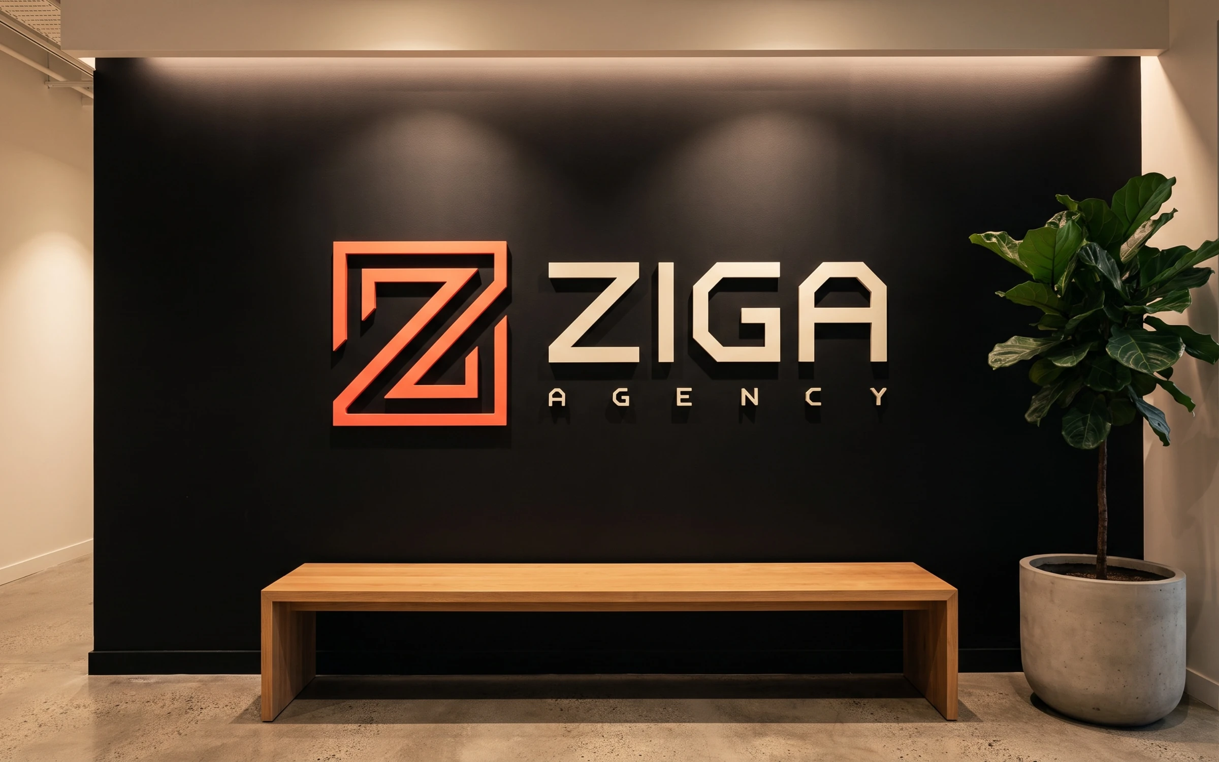 Logo da Ziga em letras caixa na parede preta da recepção
