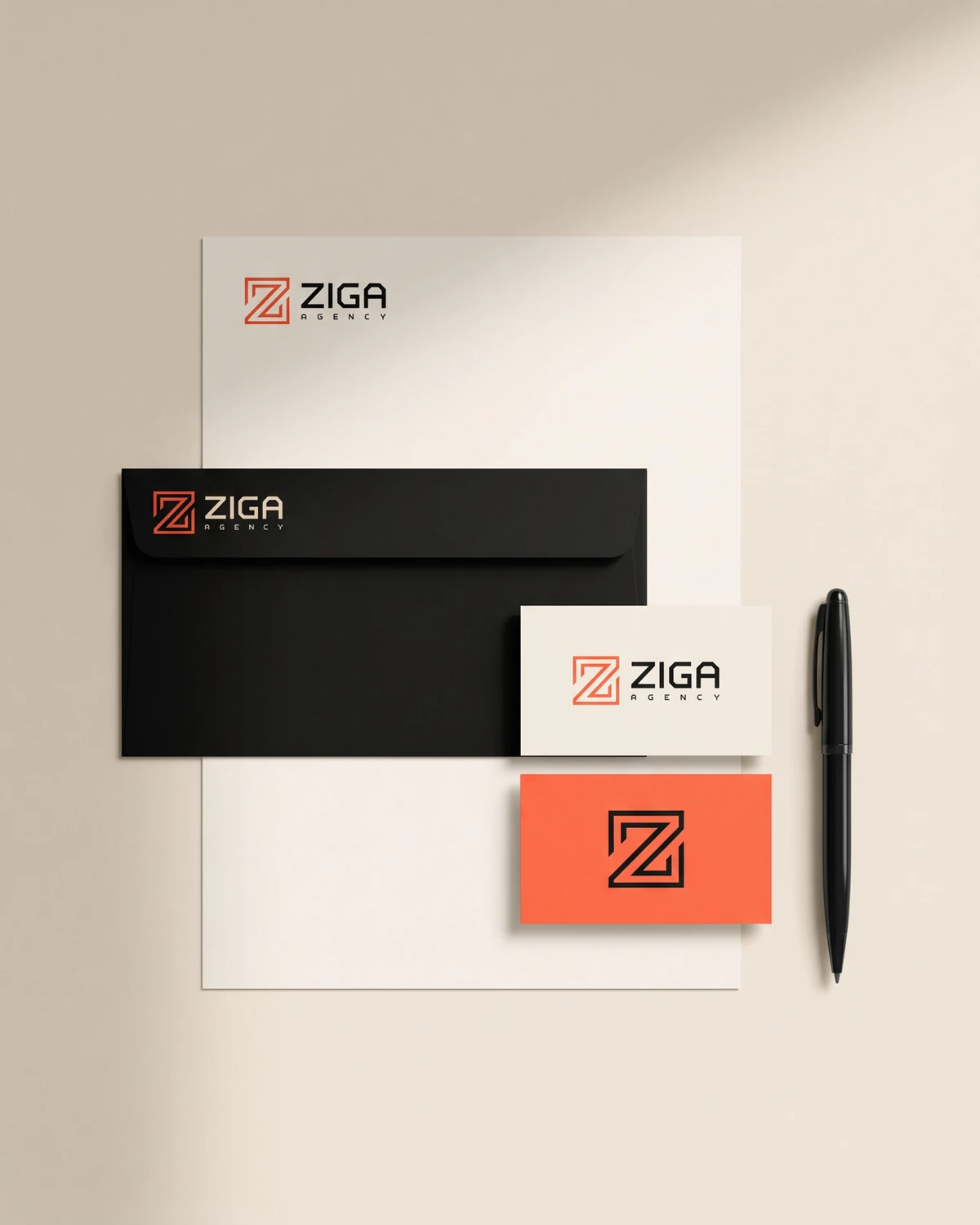 Papel timbrado, envelope preto e cartões da Ziga