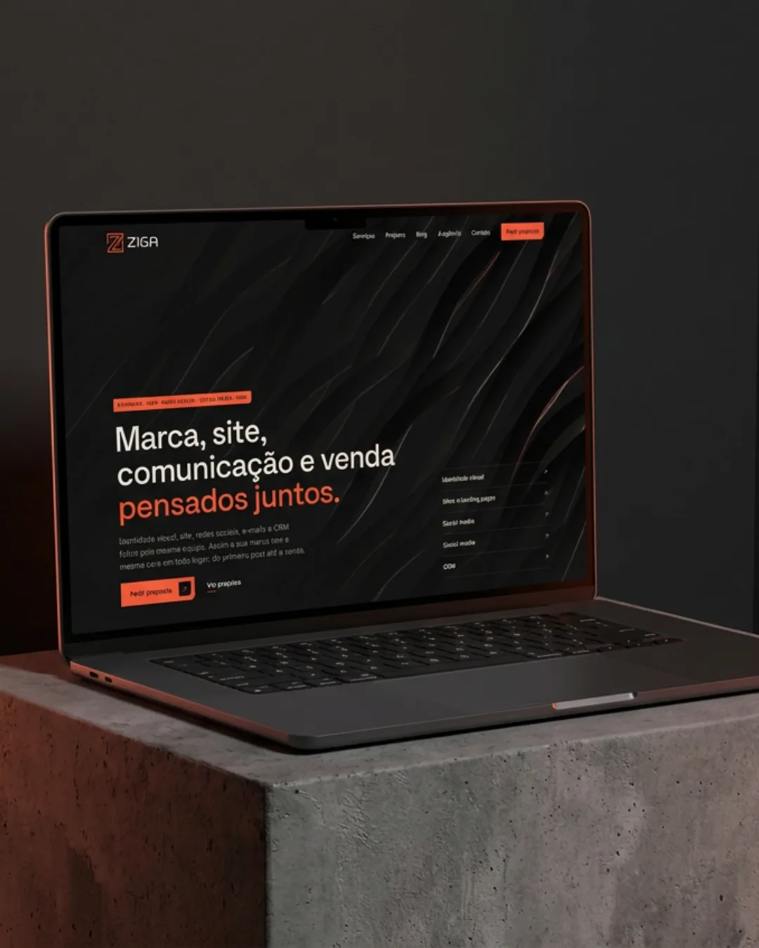 Laptop with the Ziga Agency home page open