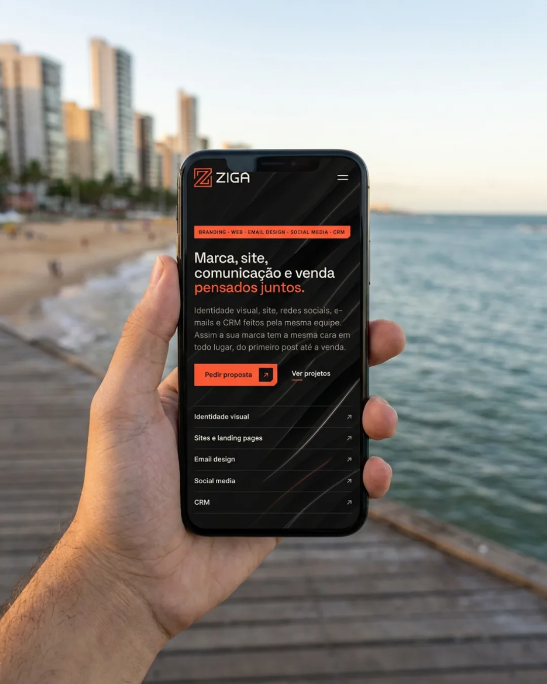 Phone with the Ziga Agency website open, in two photos